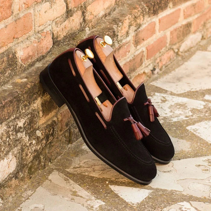 Pair of black suede tassel Nonda Loafers II with rounded toe